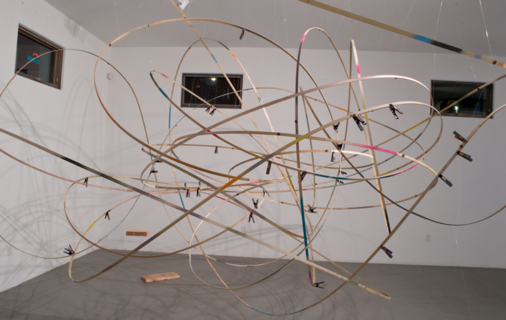 Karl Hofmann, 2016, Comes Around, Goes Around (again), dimensions variable 12' x 12' x 12', poplar, fishing line, spray paint